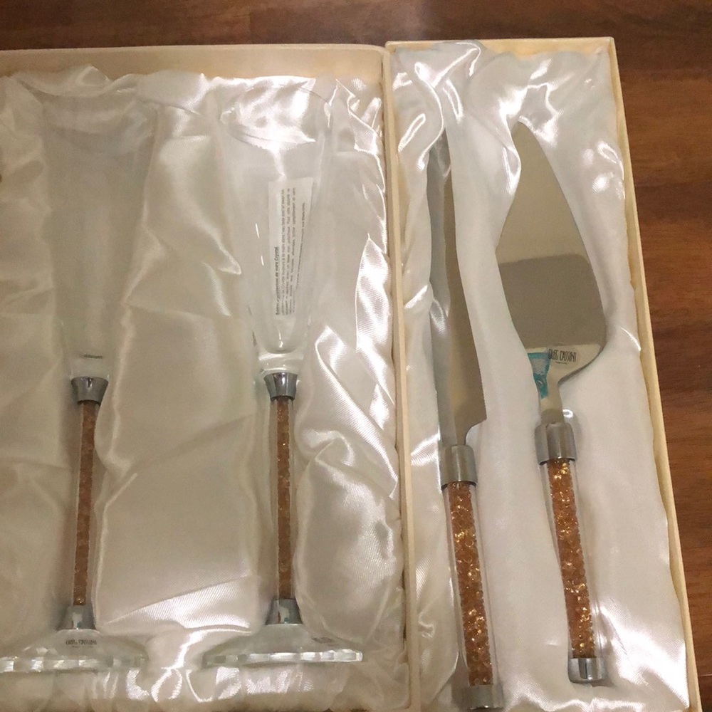 Oleg Cassini. Champagne flutes and cake serving set.